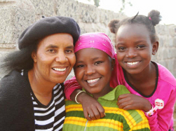 Founder Alycejo Mwangi with two beautiful young girls