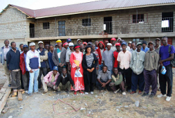 The whole gang poses for the camera at a construction project