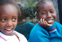 Two smiling schoolgirls