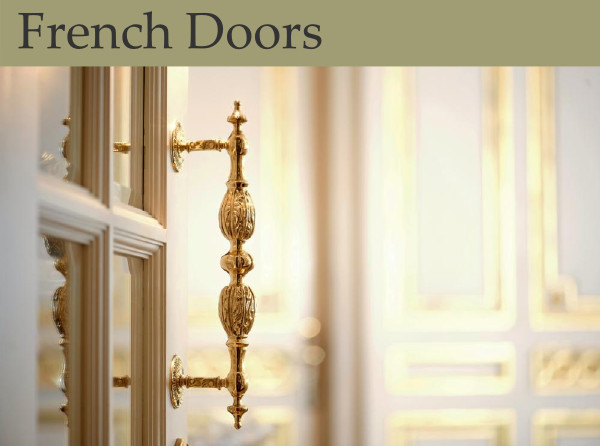 The golden handle of a french door opens invitingly