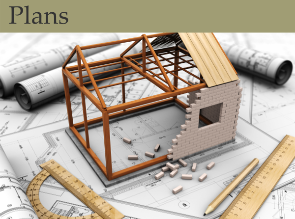 A montage of blueprints, a model house, and rulers on a desk