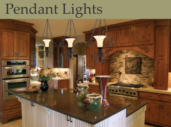 Warm pendant lamps are the perfect touch in this kitchen